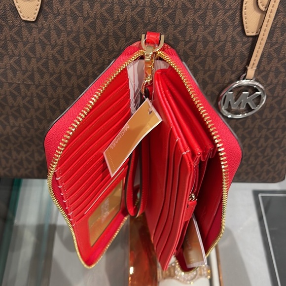 MICHAEL KORS Leather Continental Phone Holder Wristlet Wallet 
Dark Sungria
NWT - Picture 11 of 16